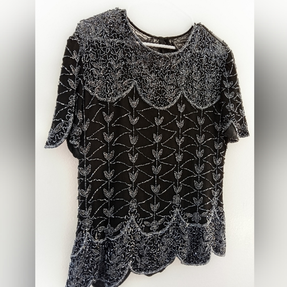 Elegant Black Blouse with White Embroidery